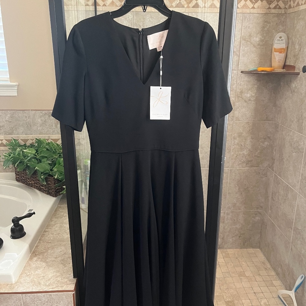 Gal Meets Glam black dress. Fully lined size 6.